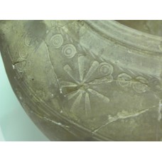 Clay cylindrical vessel, sun symbol, cross with rays